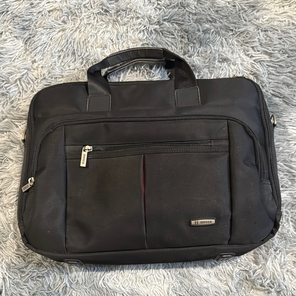 Black Briefcase with Sleek Design and Durable Material